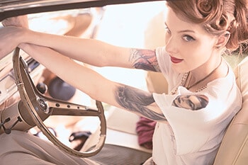 Jill in a vintage car